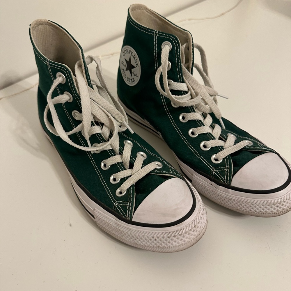 Green Converse high tops